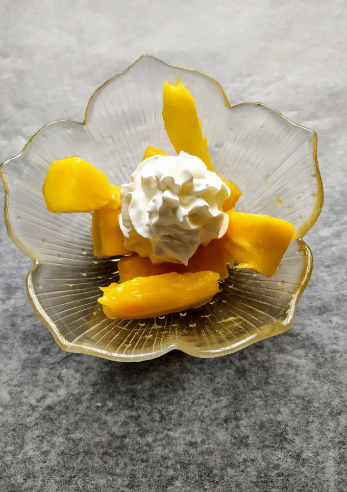 Una foto de Mango con nata