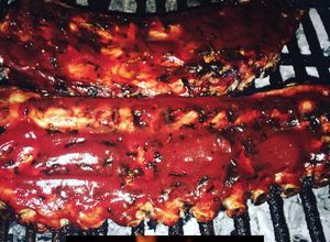 Una foto de RIBS BBQ a la parrilla