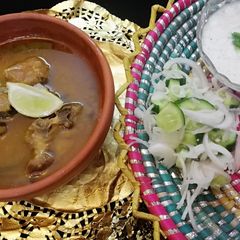 A picture of Alo chicken curry.