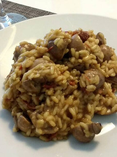 Una foto de Risotto de tomates secos y hongos