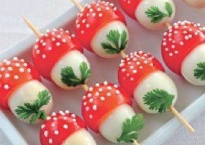 Закуска праздничная из перепелиных яиц и помидоров