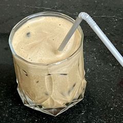 Iced coffee with no milk and no sugar A picture of Iced coffee with no milk and no sugar.