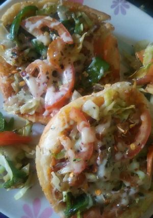 A picture of Mini pan pizza made with burger bun..