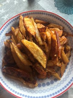 Una foto de Patatas especiadas al horno