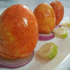 A picture of Masala boiled eggs.