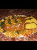 كيك برتقال مغطي بكريمة البرتقال