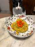 Risotto con code di mazzancolle curry e fiori di nasturzio