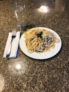 A picture of Fettuccine chicken Alfredo.