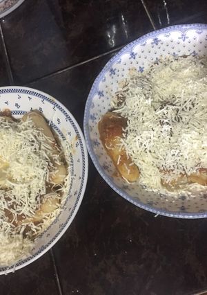 Una foto de Miquitos con salsa de tomate