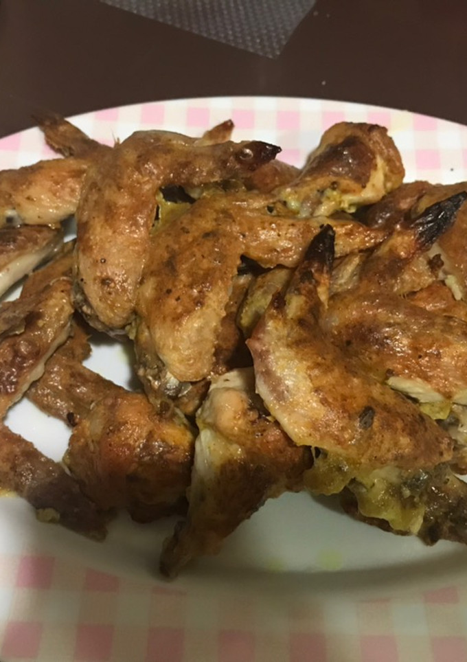 Una foto de Alitas de pollo al curry