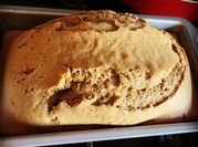 A picture of bread butter with coffee