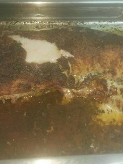 Una foto de Lomo de cerdo al horno, con salsa de especias y vino blanco