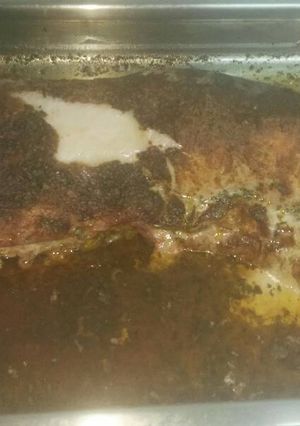 Una foto de Lomo de cerdo al horno, con salsa de especias y vino blanco