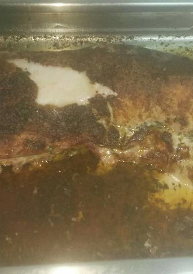 Una foto de Lomo de cerdo al horno, con salsa de especias y vino blanco