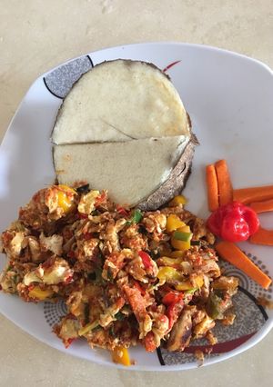 A picture of Yam and egg sauce with smoked Titus fish.