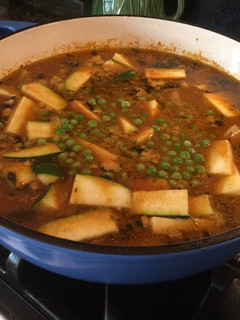 A picture of Tariwale Aloo and Mattar with Zucchini.