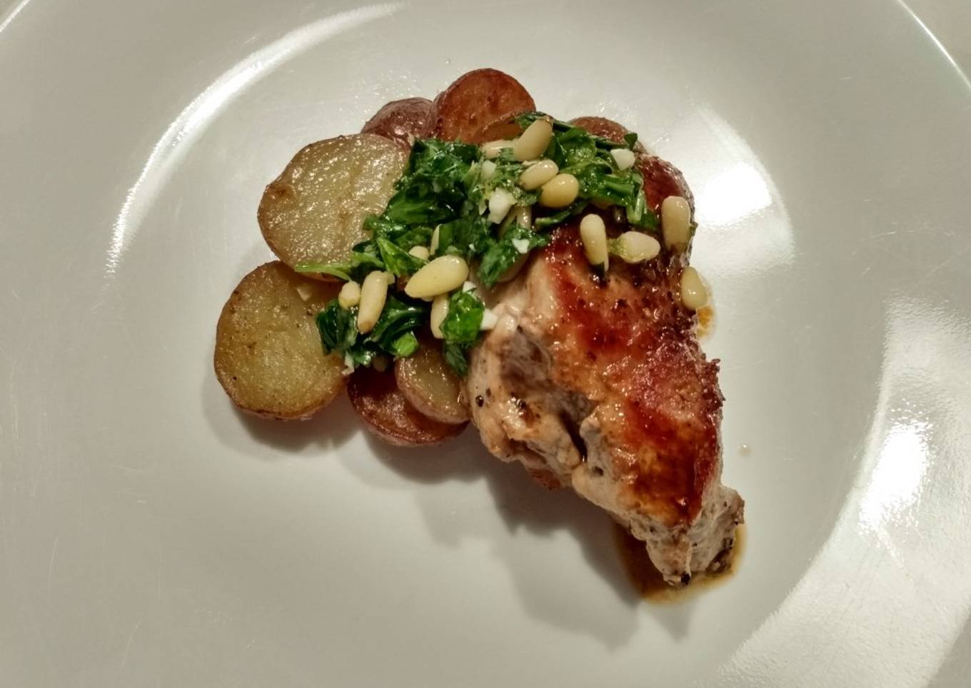 Pieces of pork with pan marsala and pine gremolata sauce