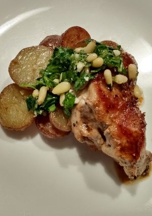 A picture of Pork tenderloin with marsala pan sauce and pine nut gremolata.
