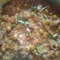 A picture of Aloo matar with tomato gravy sabji.