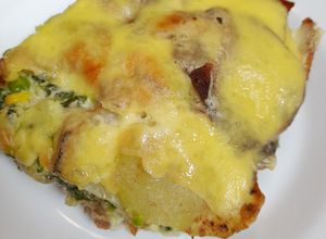 Una foto de Papas grilladas con verduras