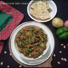 A picture of Aloo Capsicum Dry Sabji.