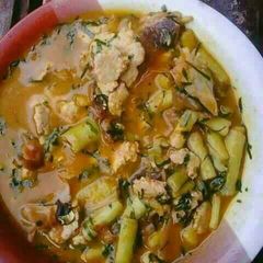 A picture of Egusi soup with auchara.