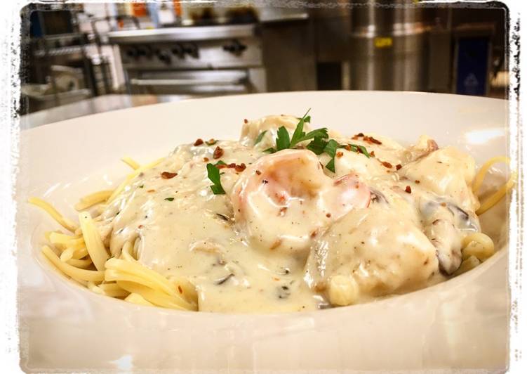 Shrimp and Scallops Shiitake, Mushroom, Bacon Cream Sauce over Pasta