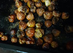 Una foto de Tomates cherry asados