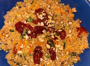 Foto di Cous Cous con Pomodorini al Forno, Zucchine e Tonno/Salmone