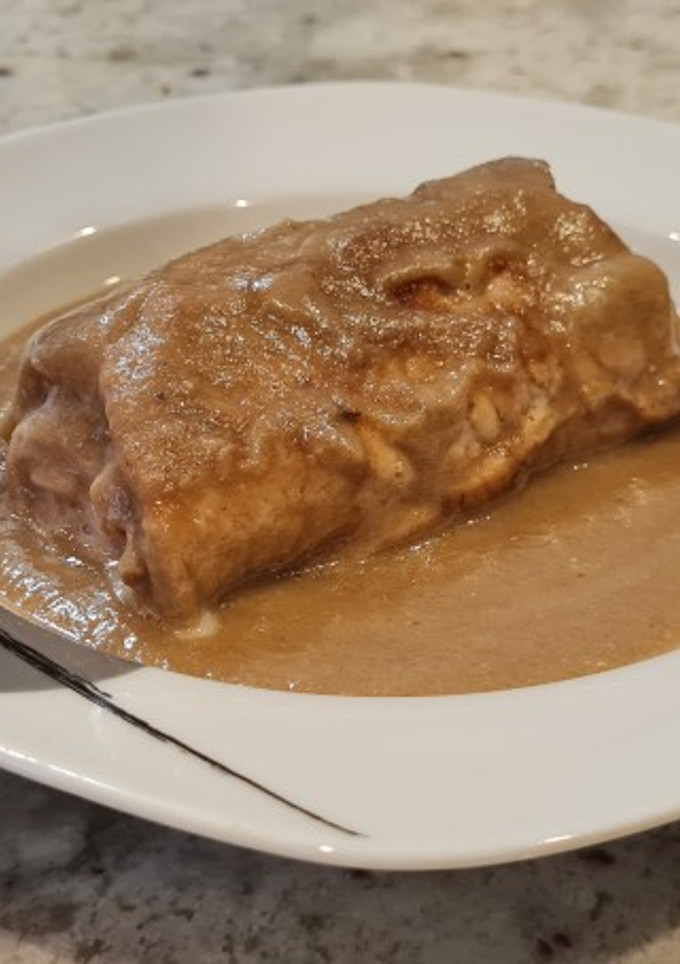 Una foto de Rollitos de lomo a los dos jamones en salsa de setas