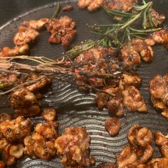 A picture of Candied and smoked walnut and hazelnut crumb.