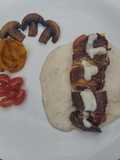 Rollitos de tasajo con salsa bechamel