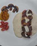 Rollitos de tasajo con salsa bechamel