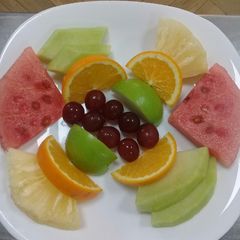 A picture of Plated fruits.#Breakfast contest#.