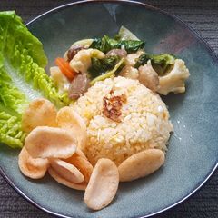 A picture of Stir Fried Veggies with Extra Leftover Chicken and Meatballs.