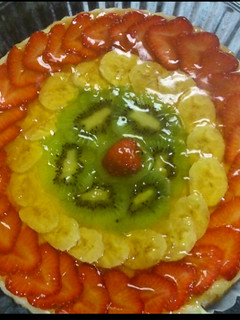 Una foto de Pastel de queso y fruta