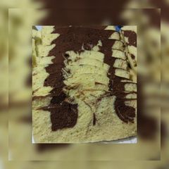 A picture of Marble cake (tea cake) in microwave.