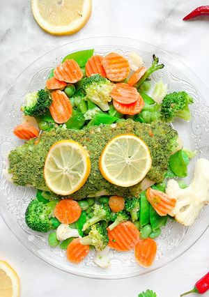 A picture of Fish with wild garlic pesto topping.