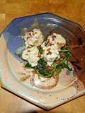 Seared Scallops with Wine Cream Sauce on Wilted Spinach