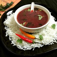 Black Grapes Gooseberry Rasam Soup A picture of Black Grapes Gooseberry Rasam Soup.