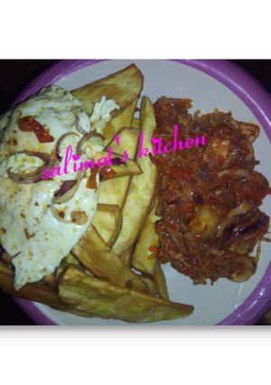 A picture of Sweet potatoes with fried egg and stew.