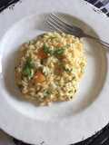 Risotto con melone, gorgonzola e rucola