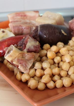 A picture of Cocido Madrileño in a Pressure Cooker.