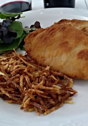 Una foto de Libritos de lomo empanados rellenos de jamón york y queso
