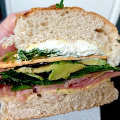 A picture of My Cheese Topped Bun with,Ham,Avocado,cheese,Cress+Soft Cheese🤩.