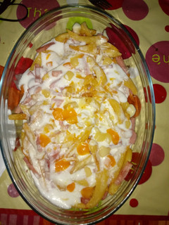 Una foto de Patatas a lo Foster´s con crema de queso semi curado
