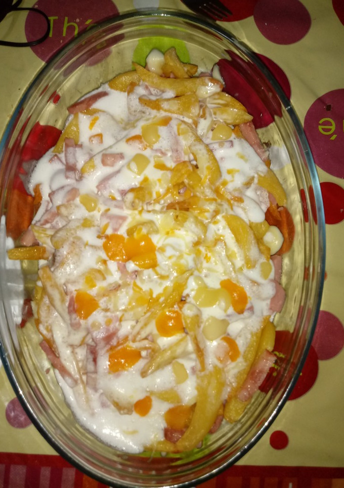 Una foto de Patatas a lo Foster´s con crema de queso semi curado