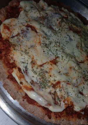 Una foto de Pizza integral