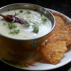 A picture of Tandulachi ukad (Rice Flour Porridge).