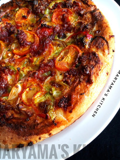 A picture of Mini cheeseless pizza.